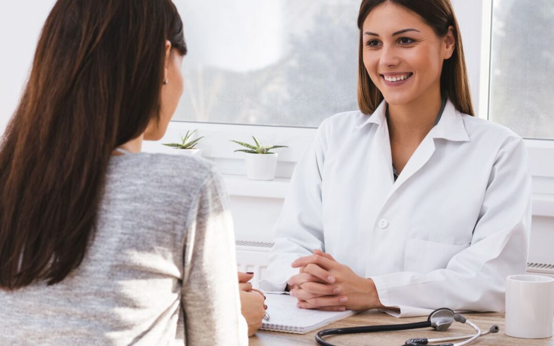 smiling female doctor helping patient