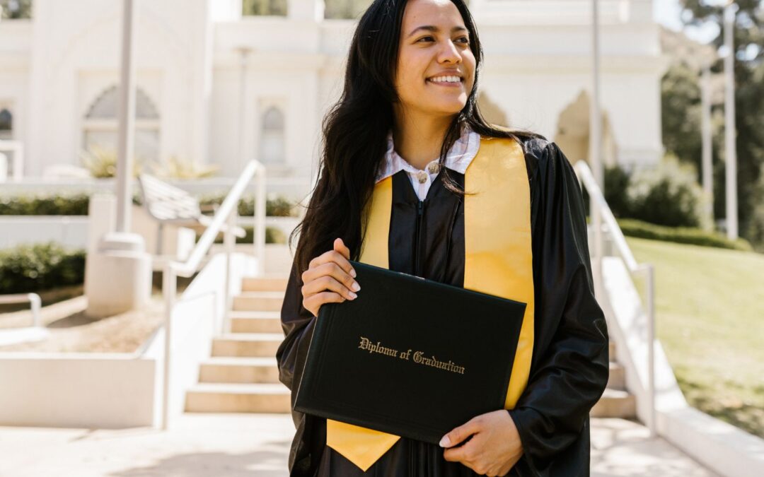 new female graduate smiling
